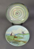 BELGIAN TUBE LINED CIRCULAR POTTERY WALL PLAQUE depicting a river landscape and windmill in pastel