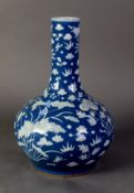 CHINESE QING DYNASTY PORCELAIN BOTTLE-SHAPE VASE, the swollen lower part beneath a cylindrical neck,