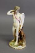 19th CENTURY GERMAN NYMPHENBURG PORCELAIN FIGURE OF A WINGED CUPID holding a bow (incomplete),