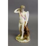 19th CENTURY GERMAN NYMPHENBURG PORCELAIN FIGURE OF A WINGED CUPID holding a bow (incomplete),