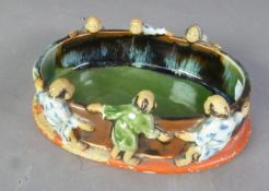 CHINESE EARLY 20th CENTURY CERAMIC ORNAMENTAL BOWL, in the form of a pond with six men looking in, 5