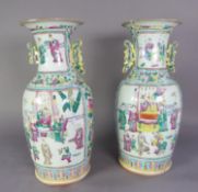 PAIR OF CHINESE LATE QING DYNASTY CANTON DECORATED PORCELAIN VASES, each with openwork handles,