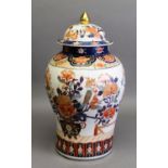 20th CENTURY ORIENTAL PORCELAIN INVERTED BALUSTER SHAPE COVERED JAR, decorated in an Imari