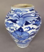 19th CENTURY JAPANESE ARITA PORCELAIN INVERSTED BALUSTER SHAPE VASE, painted in a bright