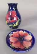 MOORCROFT POTTERY OVULAR VASE with tube lined decoration of red and dark red anemones and foliage on