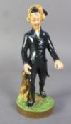 EARLY 19th CENTURY DERBY PORCELAIN DR SYNTAX FIGURE in striding posture wearing black frockcoat