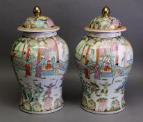 PAIR OF 20th CENTURY CHINESE INVERTED BALUSTER SHAPE POLYCHROME ENAMEL DECORATED COVERED JARS,