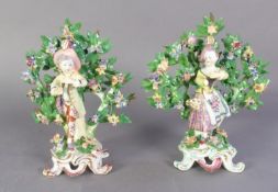 MATCHED PAIR OF 18th CENTURY BOW PORCELAIN BOY AND GIRL BOCAGE FIGURES, on turquoise blue and puce