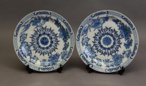 PAIR OF CHINESE LATE QING DYNASTY PORCELAIN PLATES, well-painted in underglaze blue with a lotus