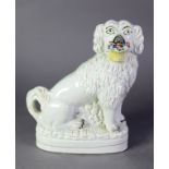 NICELY MODELLED VICTORIAN STAFFORDSHIRE POTTERY MANTEL DOG, with flower basket in its mouth and one