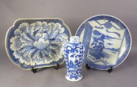 JAPANESE MEIJI PERIOD BLUE AND WHITE PORCELAIN SHAPED OBLONG SHALLOW DISH, moulded in bas-relief