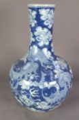 CHINESE QING DYNASTY PORCELAIN VASE, painted in underglaze blue, the bulbous lower part with two