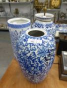 TWO TWENTIETH CENTURY CHINESE GOOD SIZE BLUE AND WHITE OVULAR VASES, ONE WITH COVER ABSENT, 16" (