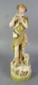 INTER-WAR YEARS ROYAL DUX FIGURE OF A SHEPHERD playing a flute with two sheep at his feet,