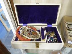 A WHITE JEWELLERY CASE CONTAINING SMALL QUANTITY OF COSTUME JEWELLERY; INCLUDING; NECKLACES VARIOUS,