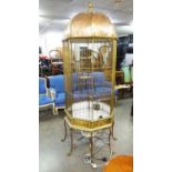 TWENTIETH CENTURY COPPER AND GILT BRASS LARGE FLOOR STANDING BIRD CAGE, of octagonal form with