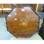 A MAHOGANY OCTAGONAL SHAPED BUTLER'S TRAY, HAVING INLAID LUTE DECORATION WITH TWO BRASS CARRYING