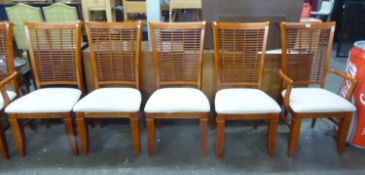 A SET OF SIX CONTINENTAL HARDWOOD DINING CHAIRS, INCLUDING A PAIR OF CARVER’S ARMCHAIRS, WITH BAMBOO