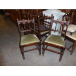 A SET OF SIX 17TH CENTURY STYLE CARVED OAK ‘DERBYSHIRE’ DINING CHAIRS, WITH DROP-IN SEATS, COVERED
