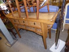 CHINESE LIGHT HARDWOOD DRESSING TABLE, WITH RAFFIA PANELLED TOP AND FRONTS TO THE THREE SMALL FRIEZE