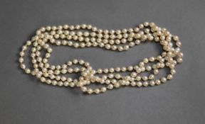 VERY LONG SINGLE STRAND CONTINUOUS NECKLACE of uniform cultured pearls