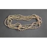 VERY LONG SINGLE STRAND CONTINUOUS NECKLACE of uniform cultured pearls