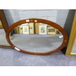 OVAL BEVELLED EDGE WALL MIRROR, IN INLAID MAHOGANY FRAME, 35 1/2in x 23 1/2in (90.1 x 59.6cm)