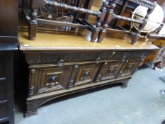 VICTORIAN CARVED MAHOGANY SIDEBOARD WITH TWO PIANO FRONTED FRIEZE DRAWERS OVER THREE CUPBOARD