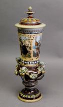 LATE 19th CENTURY GERMAN VILLEROY & BOCH (Mettlach) STONEWARE TALL, COVERED VASE, finely moulded,