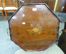 A MAHOGANY OCTAGONAL SHAPED BUTLER'S TRAY, HAVING INLAID LUTE DECORATION WITH TWO BRASS CARRYING