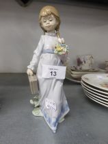 LLADRO FIGURE OF A YOUNG GIRL CARRYING A SMALL CASE AND A BUNCH FLOWERS, 8 1/2in (21.5cm) high