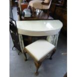 OAK RUDIMENTARY DEMI-LUNE DRESSING TABLE, THE TOP WITH FAWN FABRIC COVER AND LOOSE PLATE GLASS
