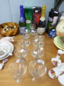 SET OF TWELVE BABYCHAM GLASSES AND A BOTTLE OF BABYCHAM; BOTTLES OF PORT, SHERRY AND POMAGNE (ALL