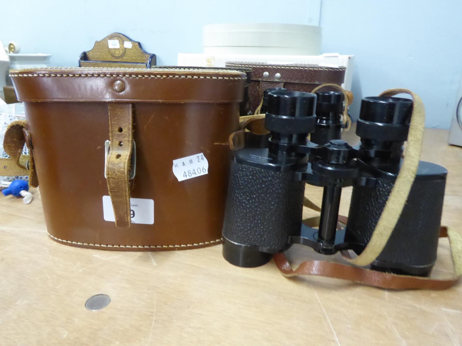 PAIR OF DELACROIX, PARIS, PRISM BINOCULARS WITH 7 X 35 COATED LENSES, IN LEATHER CASE