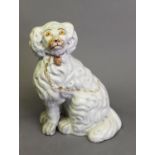 SINGLE VICTORIAN STAFFORDSHIRE POTTERY MANTELSHELF SPANIEL with in the round front leg, enamelled