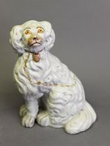 SINGLE VICTORIAN STAFFORDSHIRE POTTERY MANTELSHELF SPANIEL with in the round front leg, enamelled