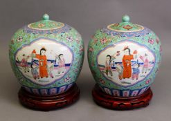 PAIR OF CHINESE REPUBLIC PERIOD PORCELAIN SWOLLEN ORBICULAR JARS WITH COVERS, all-over polychrome