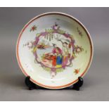 CHINESE LATE 19th CENTURY FAMILLE ROSE PORCELAIN SAUCER DISH decorated with figures in a garden by a