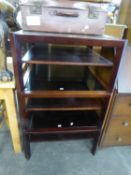 PAIR OF MODERN DARK MAHOGANY SQUARE COFFEE TABLES, WITH SMOKED GLASS TOPS, UNDERSHELF ON TRIFORM