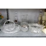 CUT GLASS BASKET SHAPED FRUIT BOWL, WITH LOOP HANDLE; A CUT GLASS TEAR SHAPED DECANTER ADN