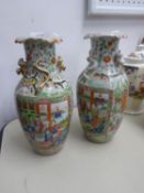 PAIR OF CHINESE PRE-WAR FAMILLE ROSE OVOID VASES, TYPICALLY DECORATED WITH FIGURES IN RESERVES AND