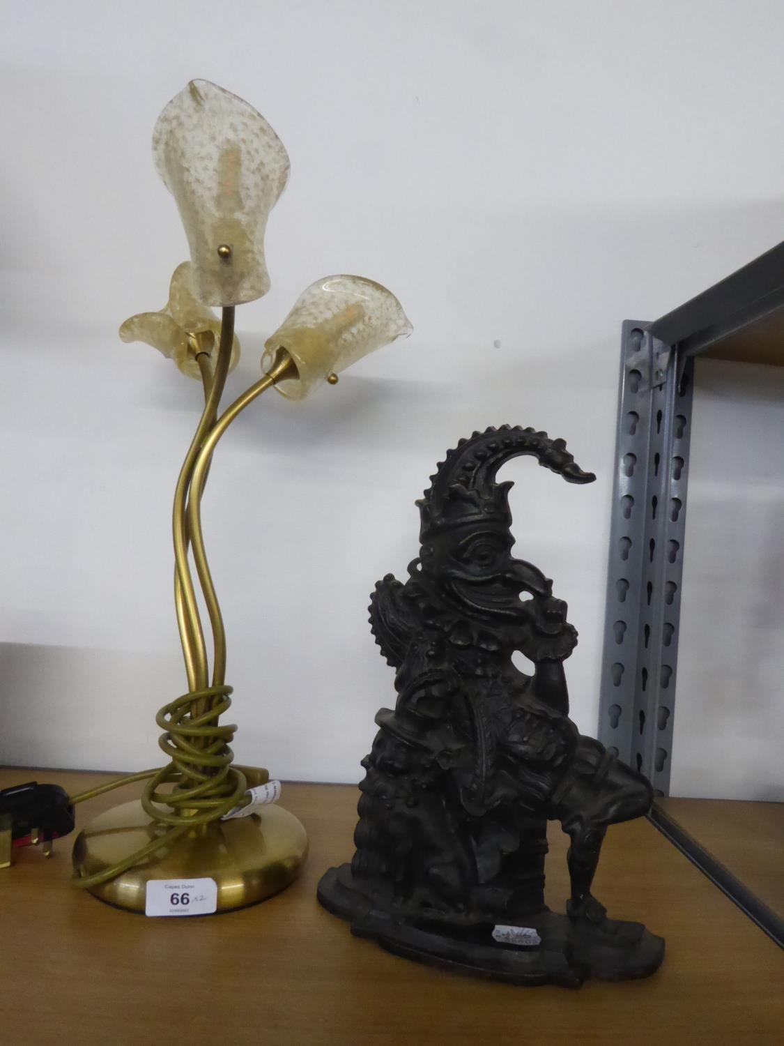 BLACK CAST IRON MR PUNCH DOORSTOP, 11 ½” (29.2m) high, together with a MODERN TABLE LAMP WITH
