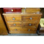 VICTORIAN PITCH PINE CHEST OF TWO SHORT AND TWO LONG DRAWERS, WITH LOW LEDGE BACK, MOULDED GLASS