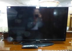 A SAMSUNG 32" FLAT SCREEN TV WITH REMOTE CONTROL