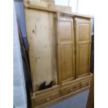 GOOD QUALITY LARGE PINE THREE DOOR WARDROBE HAVING 3 DRAWER BASE WITH KNOB HANDLES, 195cm high x