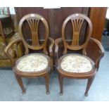 A PAIR OF, CIRCA 1920'S, MAHOGANY OPEN ARM DESK CHAIRS, OVAL BACK WITH FIVE BAR SPLAT CANEWORK