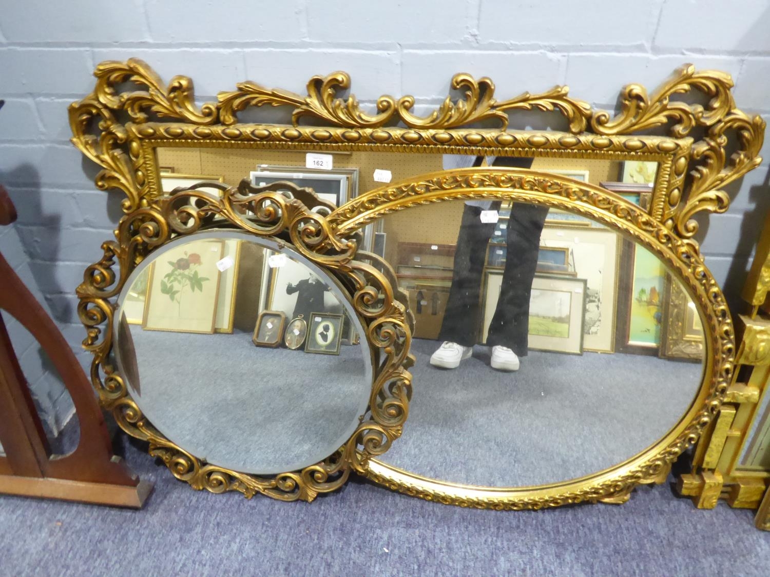 THREE MODERN GILT FRAMED WALL MIRRORS, the largest, 29 ½” x 40” overall, (3)