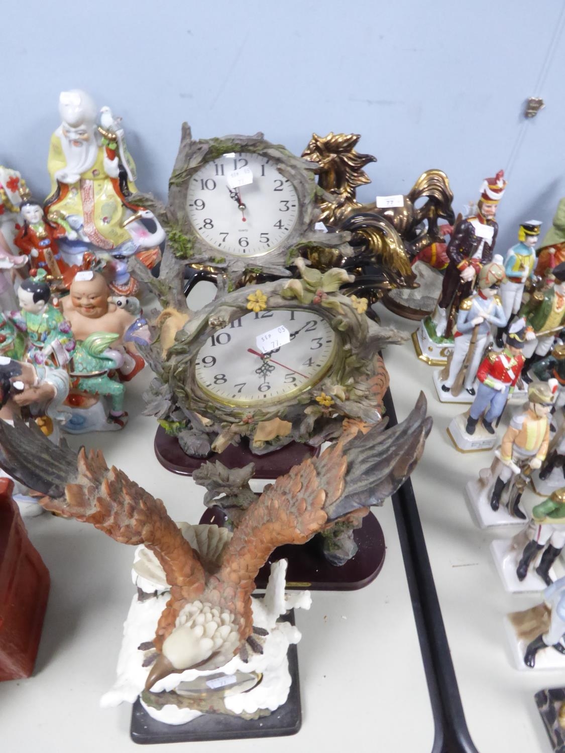 FIVE MODERN CONTINENTAL PORCELAIN OR COMPOSITION MANTLE CLOCKS MODELLED WITH ANIMALS, (5)