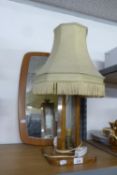 CIRCA 1960S' OAK AND GLASS PANEL TABLE LAMP AND SHADE and a 1960's ROUNDED OBLONG WALL MIRROR (2)