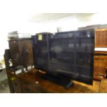 SAMSUNG FLAT SCREEN TELEVISION, 43”, WITH VIDEO CASSETTE PLAYER AND DVD PLAYER, ON STAND